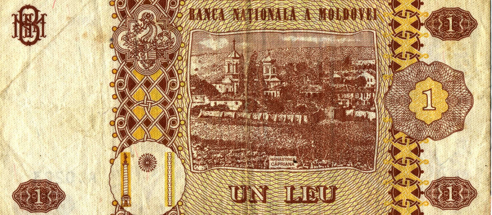 Reversul bancnotei de 1 leu moldovenesc, seria 2010, cu mănăstirea Căpriana