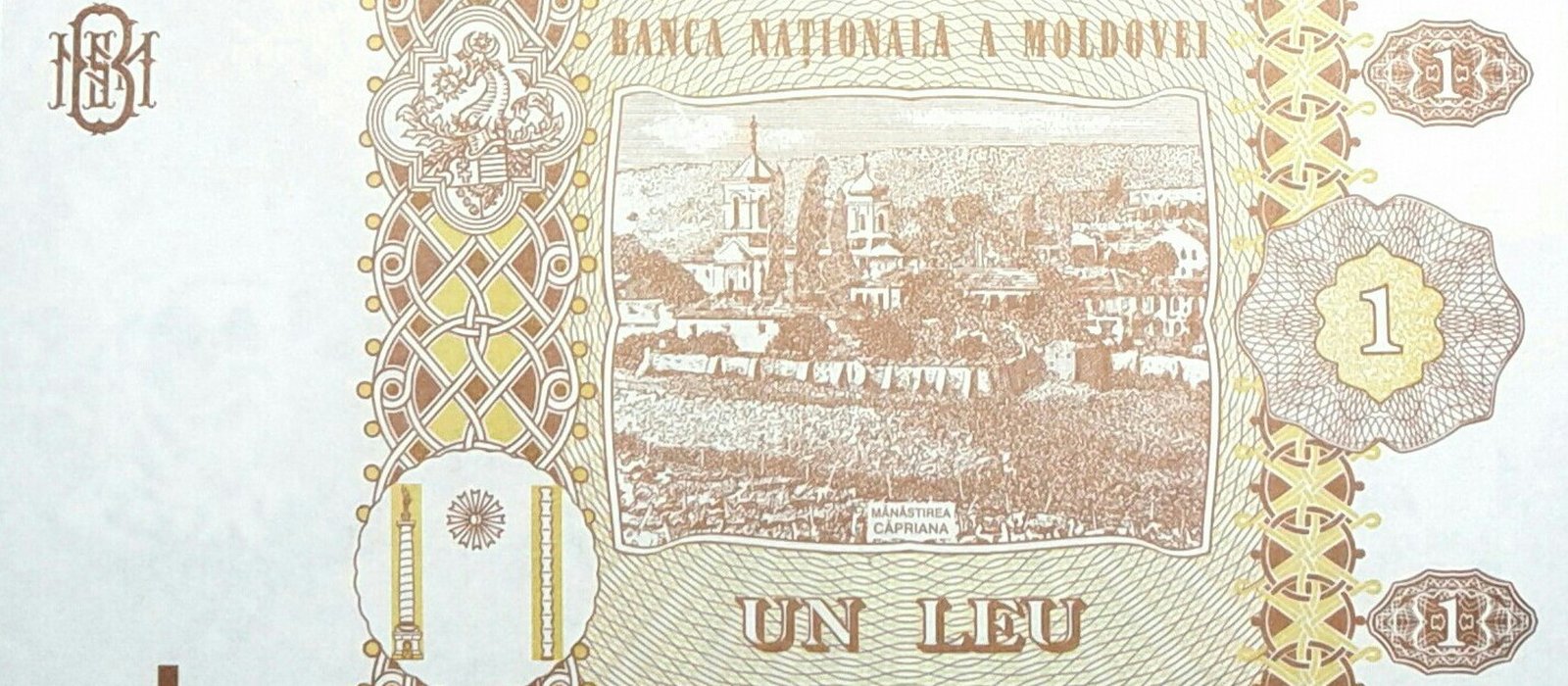Reversul bancnotei de 1 leu din seria 2015 a Republicii Moldova, cu motive decorative și valoarea nominală